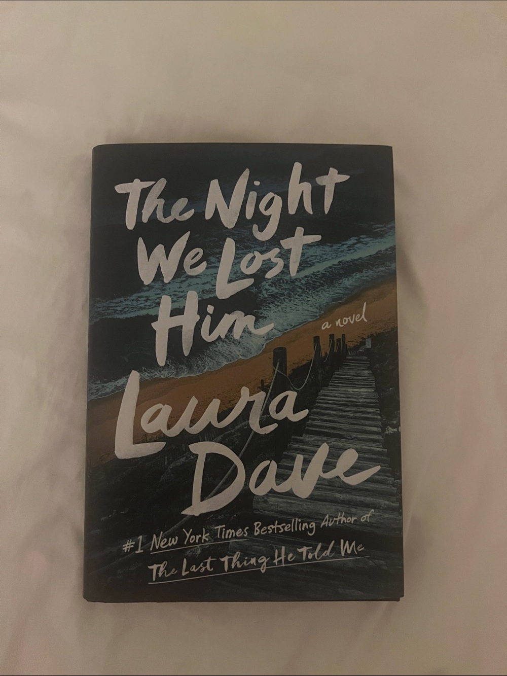 The Night We Lost Him by Laura Dave - Dark Teal & Sand Hardcover